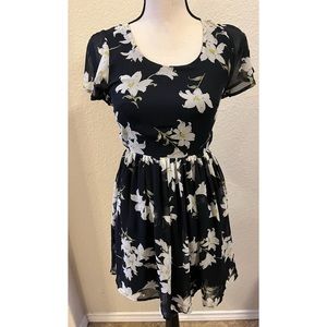 Black dress with white flowers and open back